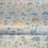 ECO-LAMINATED | MARCHING DINO (Mustard)