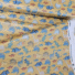 ECO-LAMINATED | MARCHING DINO (Mustard)