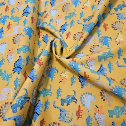 COTTON | MARCHING DINO (Mustard)