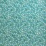 Corduroy What a Pretty Daisy Mint. Mint green background with lots of white daisies.