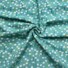 Corduroy What a Pretty Daisy Mint. Mint green background with lots of white daisies.