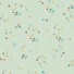 Mystery eco-laminated fabric in light sage, featuring a scattered pattern of small stars, crosses, and geometric shapes in mustard, teal, coral, pink, and grey on a pale sage background.